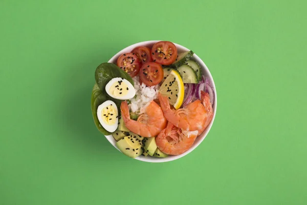 Top View Poke Bowl Shrimps Rice Vegetable Green Background Close — стоковое фото