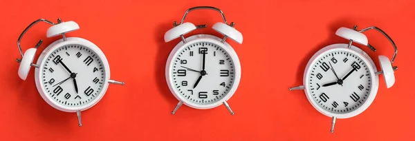 Collage White Alarm Clock Red Background Top View Close — Foto Stock