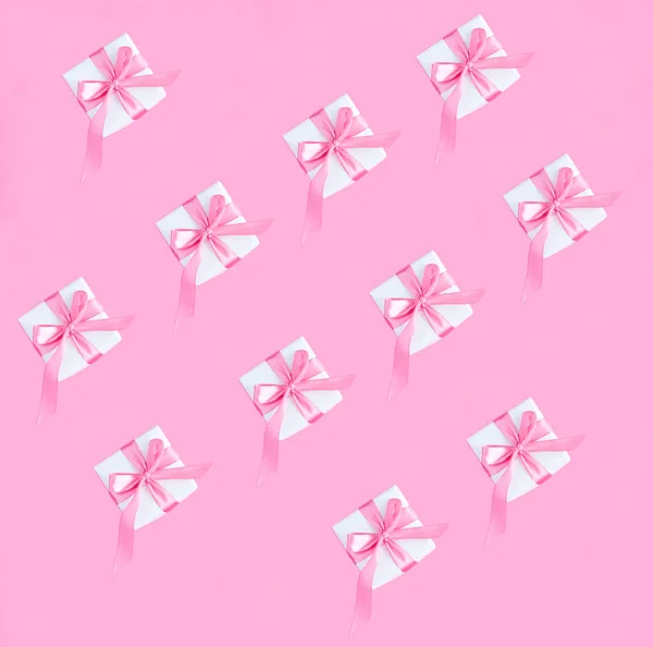 Top View Gift Box Tied Pink Bow Pink Background Pattern — Stock Photo, Image