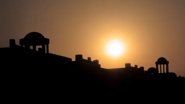 Sun setting over Temples — Stock Photo, Image