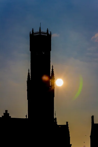 Silhouette of the clock tower of Bruges — Stock Photo, Image