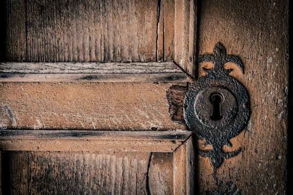 Don't peek through the key hole — Stock Photo, Image