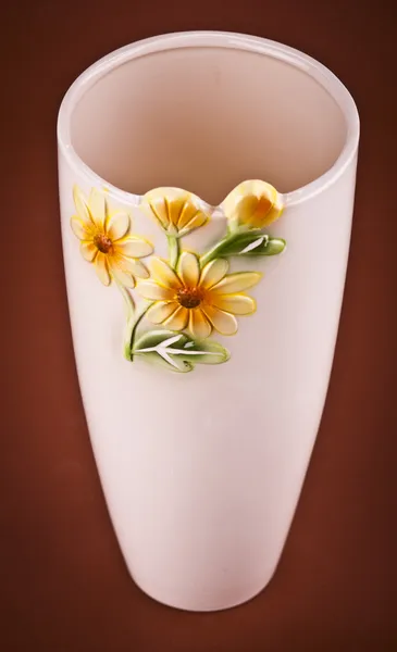 Modern clay vase on brown background — Stock Photo, Image