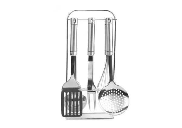 Rack of kitchen utensils, isolated on white. — Stock Photo, Image