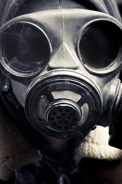 portrait man in gas mask