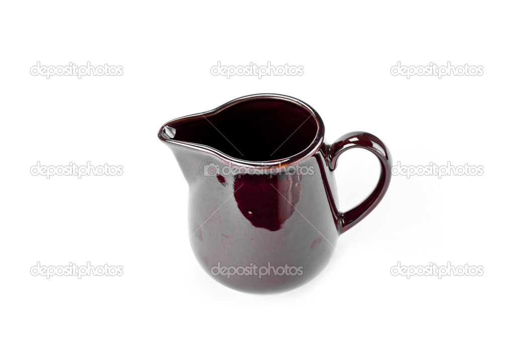 Old ceramic jug isolated on white background