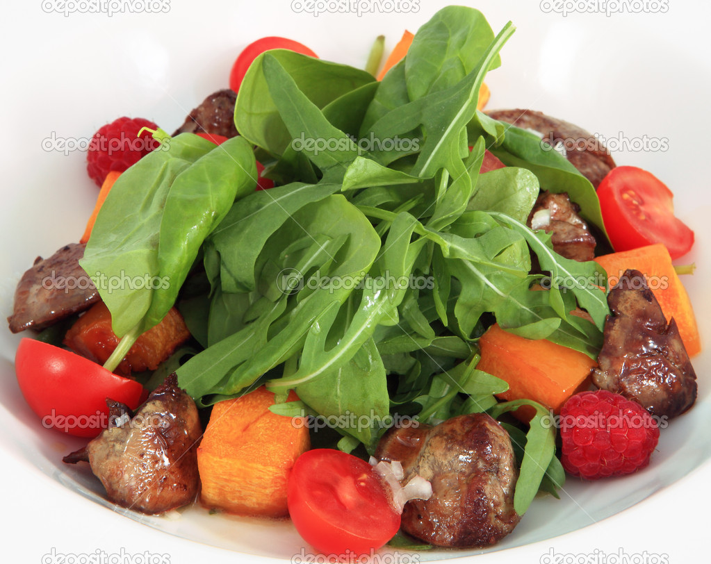 Salad with baked pumpkin and chicken liver.