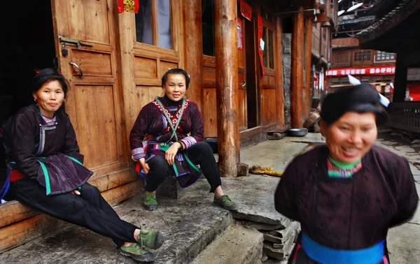 Asian woman in traditional, national, ethnic costumes of Dong people.