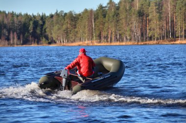 Dark Green, Inflatable Rubber Dinghy Boat With Motor, Forest Lake. clipart
