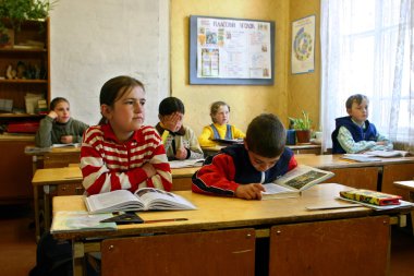 Classroom with pupils in Russian ungraded rural school clipart