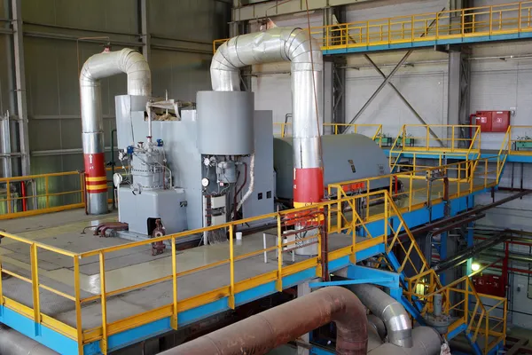 Steam turbine rotates generator in the turbine hall — Stock Photo, Image