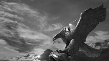 Sculpture of an eagle in the rays of the setting sun
