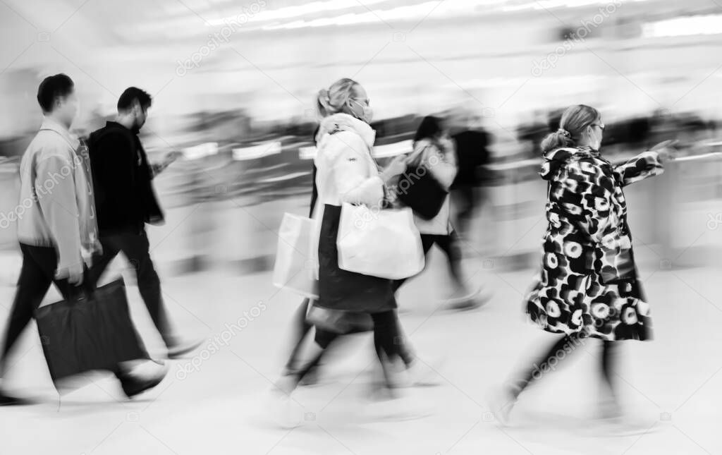 The power of motion blur: people walking in a mall lobby