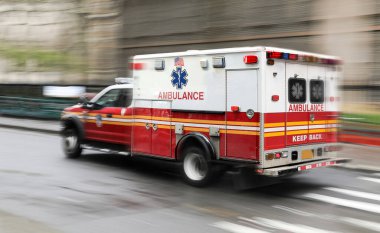 Ambulance on emergency vehicle in motion blur