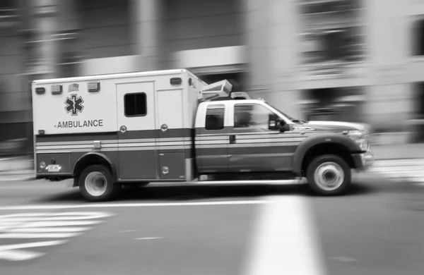 Ambulance on emergency vehicle in motion blur