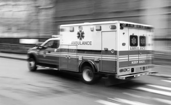 Ambulance on emergency vehicle in motion blur