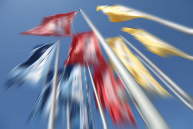 Blurred background with three with different flags