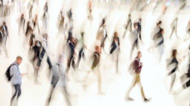 Blur of focus, people in the lobby of a public building