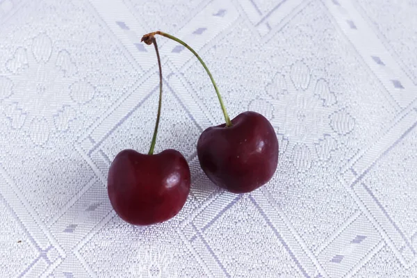 Two Cherries White Tablecloth — Stock Photo, Image