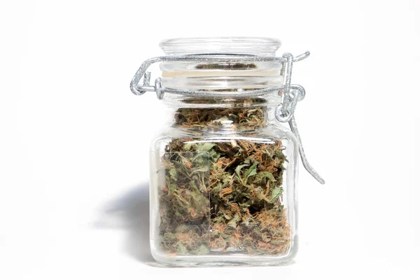 Marihuána Kannabiszbimbók Üvegedényben Fehér Alapon — Stock Fotó