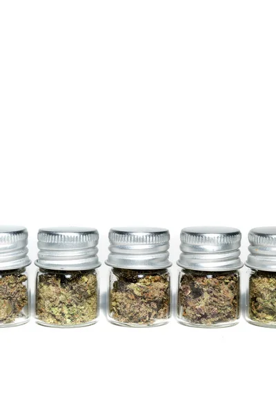 Closeup Marijuana Buds Glass Jars Isolated White Background — Foto Stock