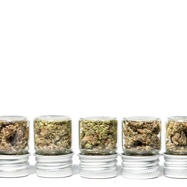 Closeup Marijuana Buds Glass Jars Isolated White Background — Stok fotoğraf