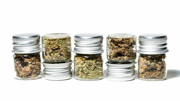 Closeup Marijuana Buds Glass Jars Isolated White Background — Zdjęcie stockowe