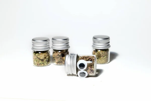 Closeup Marijuana Jars Cannabis Character Eyes White Background — Stockfoto