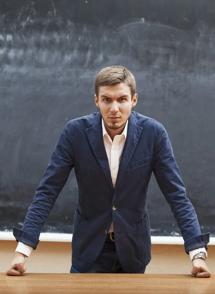 Serious teacher looking at the camera — Stock Photo, Image