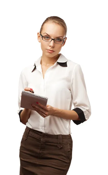 Mujer de negocios escribe en un cuaderno — Foto de Stock