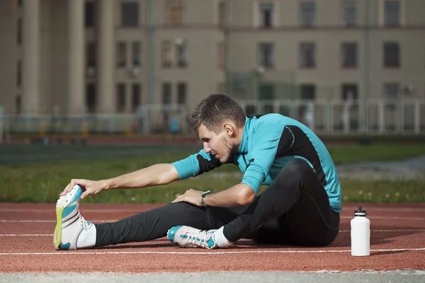 Stretching vóór uitoefening — Stockfoto