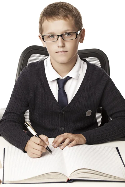 Boy writes — Stock Photo, Image