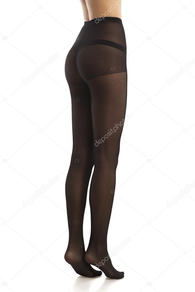 girl in black pantyhose. Isolated. White background.