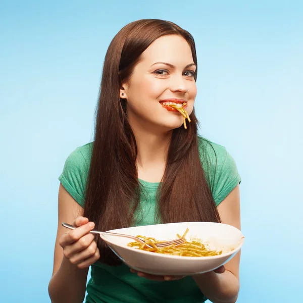Girl eats pasta. isolated — Stock Photo, Image