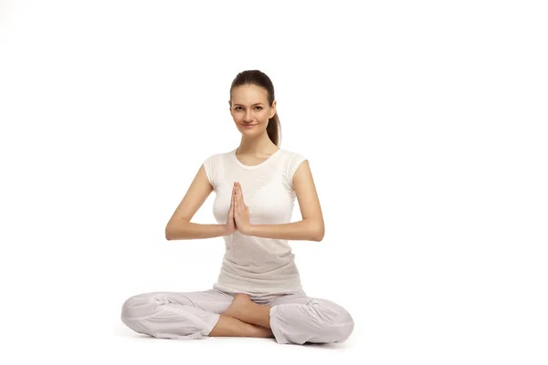 Young beautiful yoga posing on a studio background5 — Stock Photo, Image