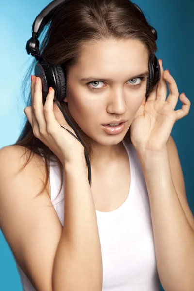 Mujer con auriculares —  Fotos de Stock