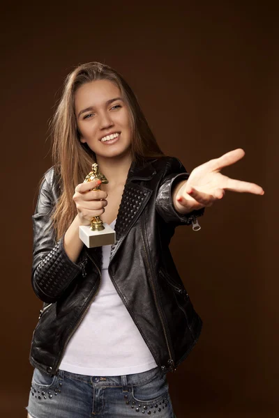 Woman holding statue — Stock Photo, Image