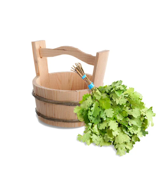 Wooden bucket and oak broom for Russian bath. — Stock Image Wooden bucket and oak broom for Russian bath. Stock Image