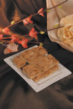Biscuits cookies, cake served with tea offered at the wedding  and party 