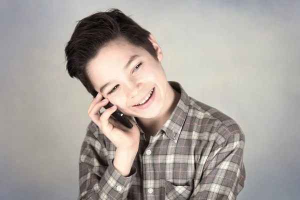 Boy on a cell phone — Stock Photo, Image