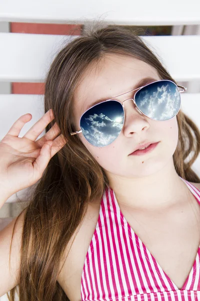 Beautiful little girl with sunglasses — Stock Photo, Image