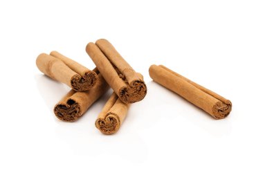 Stack of cinnamon sticks isolation