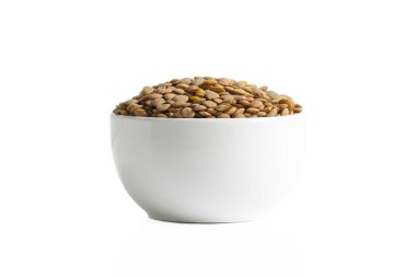 Lentils in a cup isolated on white background