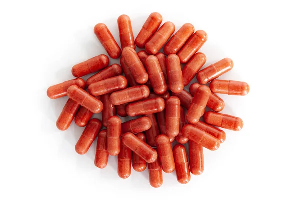 Pile Red Vitamin Capsules — Photo