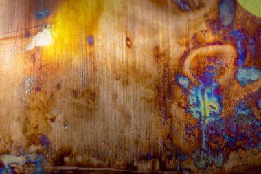 İlginç desenleri olan bakır bir sayfa. arkaplan veya doku