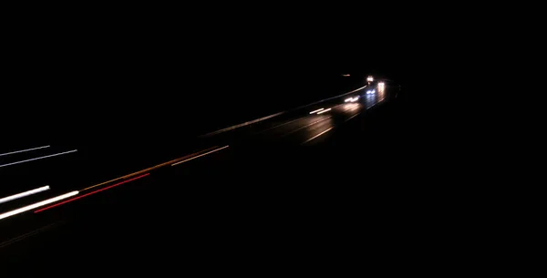 Luces Abstractas Del Coche Rojo Por Noche Larga Exposición —  Fotos de Stock