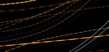 Siyah arka planda renkli çizgiler. doku