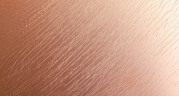 İlginç bir dokusu olan bakır bir yaprak. arkaplan