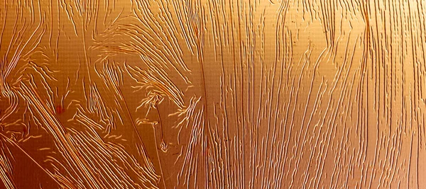 İlginç bir dokusu olan bakır bir yaprak. arkaplan