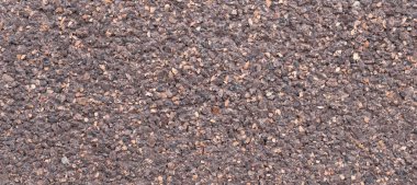 Üzerinde görünür detaylar olan kahverengi duvar sıvası. arkaplan